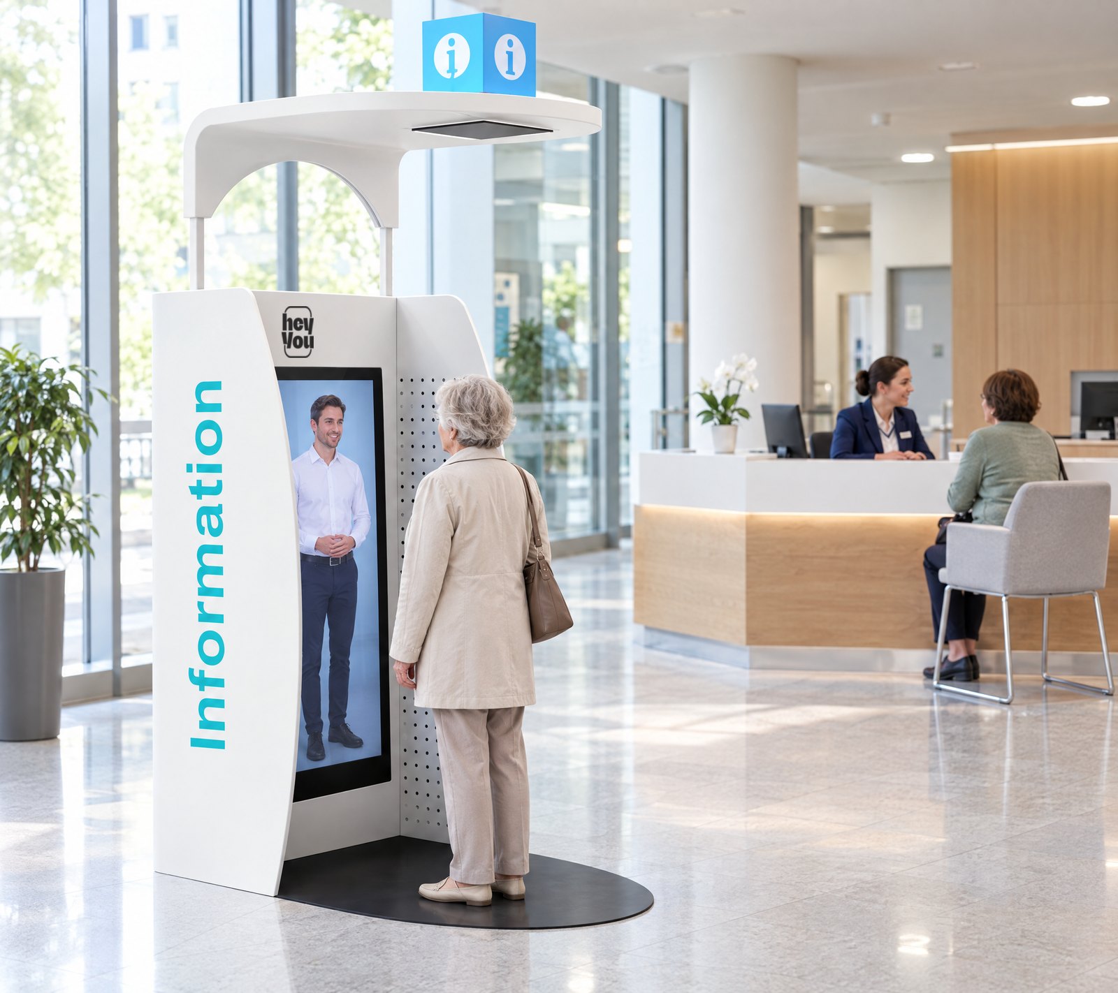 Lebensgroßer Avatar auf Augenhöhe mit einer Besucherin am Empfang einer Klinik
